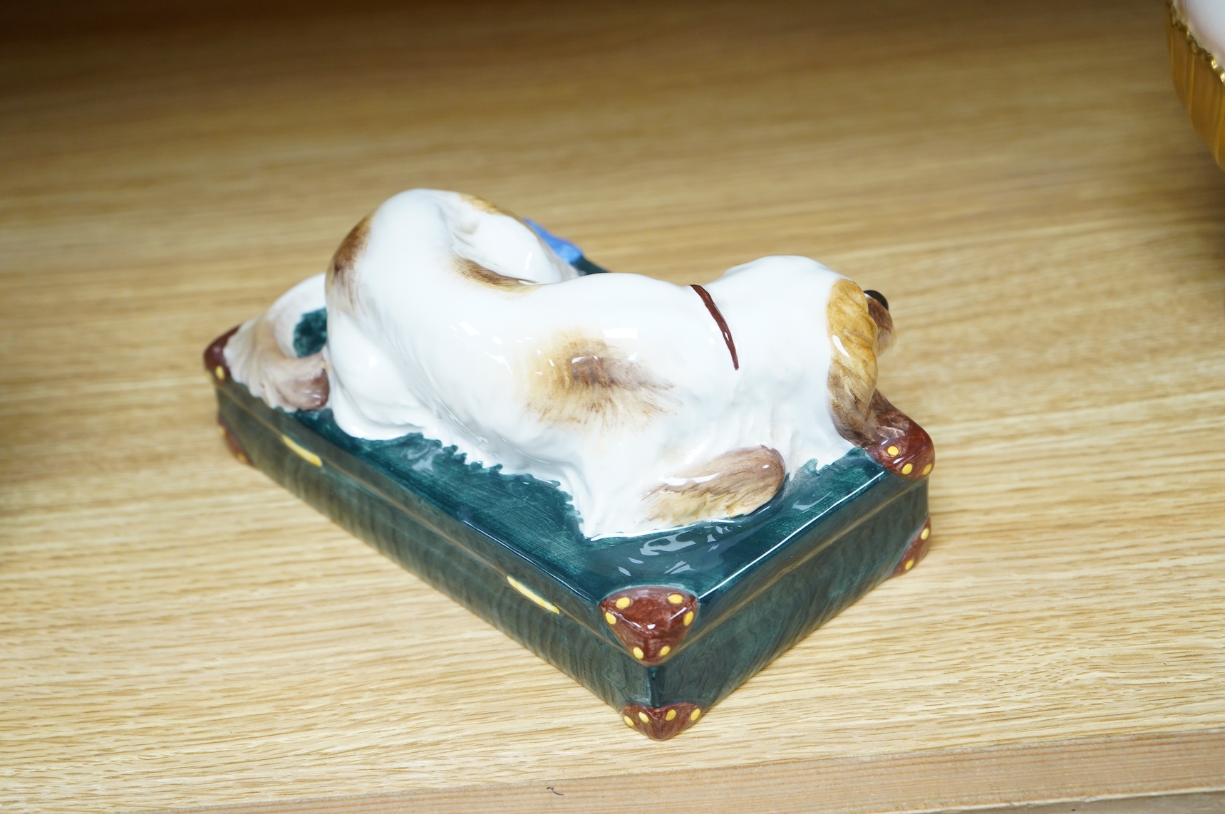 A Nove Italia ceramic sleeping dog, ‘exclusive for Tiffany & Co’ 19cm wide